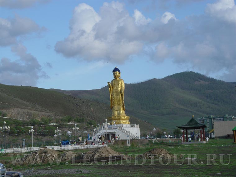 Photo. Buddha statue at the foot of Zaisan mountain.