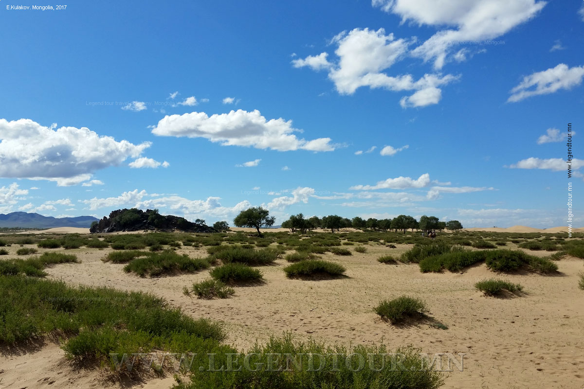 Photo. Bayan Gobi ger camp. Bayan Gobi sand dunes. Khogno Khan Uul Nature Reserve.